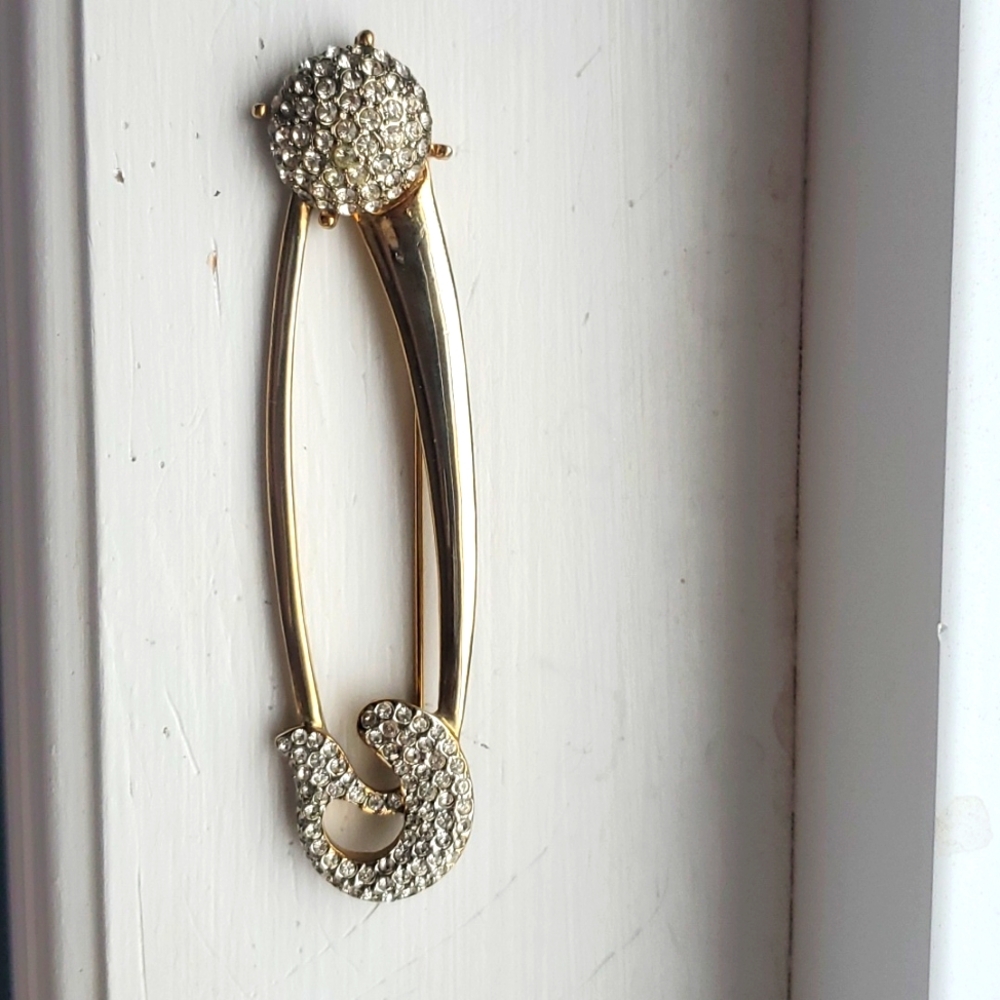 "A" brooch
